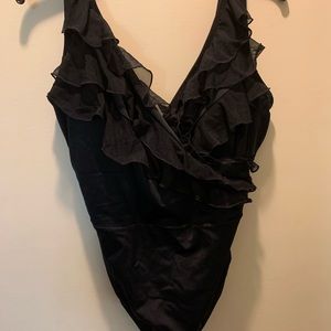 Inches away woman’s swimsuit